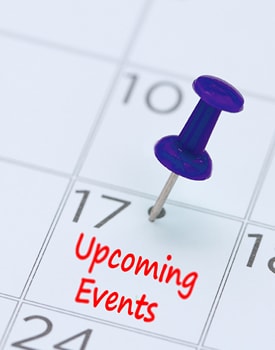 Pin stuck in a calendar with the text Upcoming Events